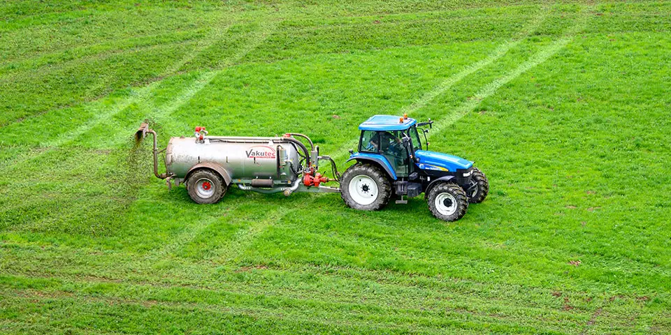 Tractor Fertilizing Field